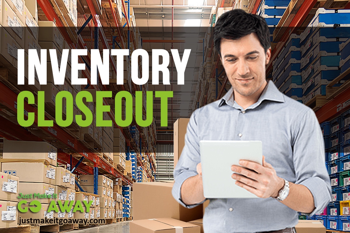 guy holding paper in warehouse during an inventory closeout